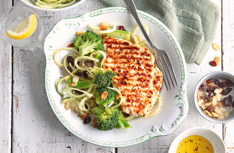 A virtuous supper of simple griddled chicken breast served alongside a broccoli, courgetti, almond and raisin salad. This fuss-free and delicious family meal is ready in just 30 minutes