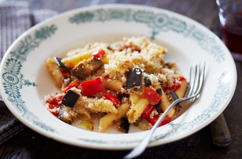 Here's a veggie pasta bake that'll please the whole family, and it's on the table in just 45 minutes. We've used free from penne here, but you could use regular wheat pasta if you prefer. Brimming with veggies, it's hearty, filling and totally delicious!