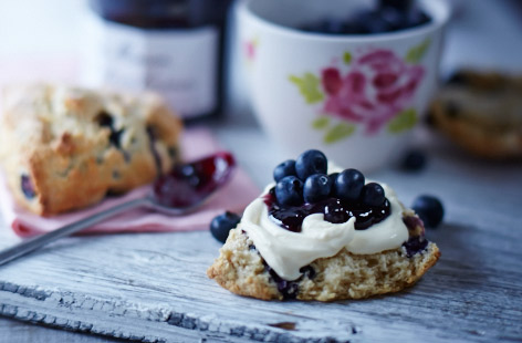 Nothing says afternoon tea like scones. These fruity scones take less than 30 minutes to make from start to finish, while zingy blueberries and tasty clotted cream are used to make the actual scones. Serve with more cream and berries, and jam, if you like.