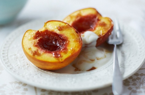 Sweet nectarines caramelise deliciously when cooked. Just 15 minutes in the oven with a little bit of sugar will turn them a beautiful golden brown. Best served with a dollop of honey and vanilla-spiked yogurt.