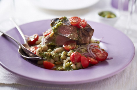 Lamb and mint sauce might be the more classic combination but this recipe for lamb leg steaks with fresh pesto sauce proves to be equally impressive. Keeping the lamb slightly pink and juicy inside is key to making this quick and simple recipe a hit.