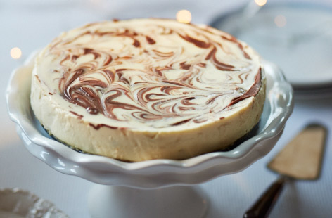 Zingy passion fruit and creamy white chocolate are a match made in heaven in this delicious cheesecake, the perfect elegant dessert to round off a dinner party