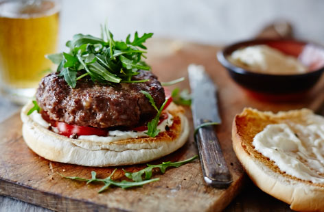 You can't beat the basics on a summer's day and there's nothing simpler (or tastier) on the grill than a beef burger. This easy-to-follow recipe involves slathering those juicy patties in a potent horseradish sauce before wedging them in a soft bun with fresh tomato and peppery rocket.