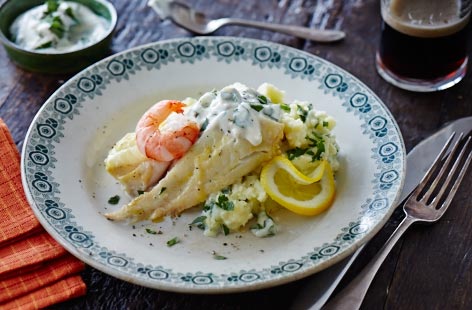This Irish-influenced recipe is a healthier take on fish pie – plus it uses parsnip as well as potato for the mash. The other difference? The mash is at the bottom, while the poached white fish and prawns top it.