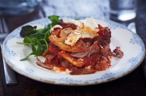 Two large lamb shanks are cooked until they quiver and fall apart in this Turkish-inspired lamb bake recipe.