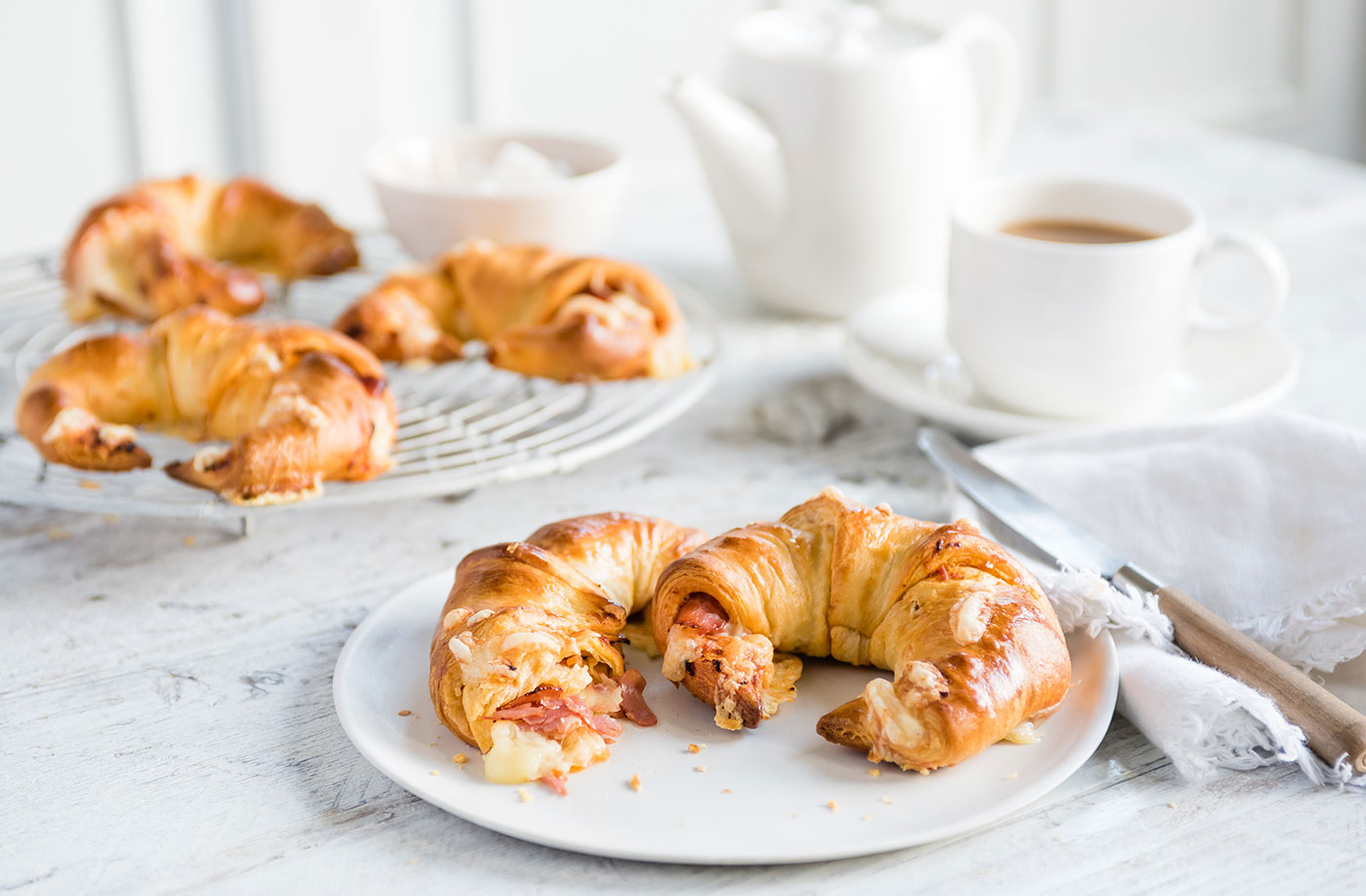 Cheese, sundried tomato and ham-stuffed croissants recipe
