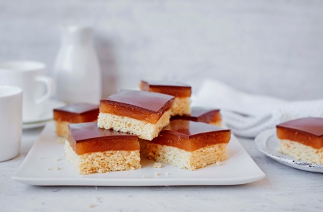 With layers of soft sponge, zesty orange and grapefruit jelly and a dairy-free chocolate topping, this quick and easy baking recipe makes the perfect low-fat snack or sweet treat
