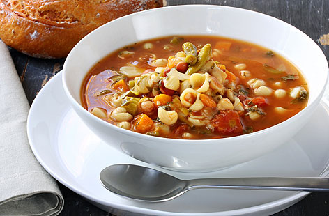 Faithful minestrone soup is jazzed up with the addition of green pesto in this veg-tastic soup. Healthy, warming and perfect for when you're on a budget, throw in a mix of vegetables, simmer and finish with a sprinkle of parmesan.