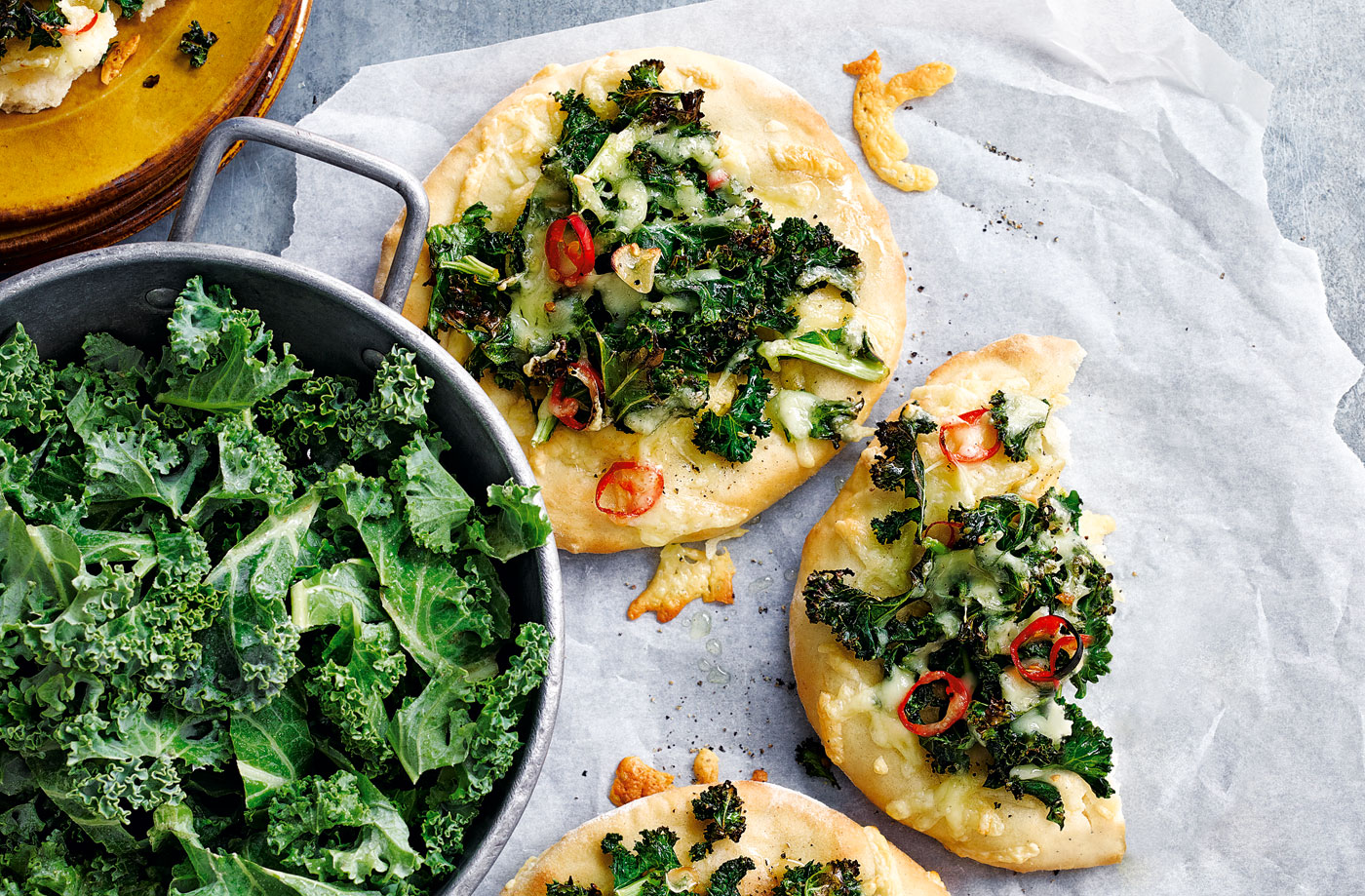 Mini kale, gouda and chilli pizzas recipe