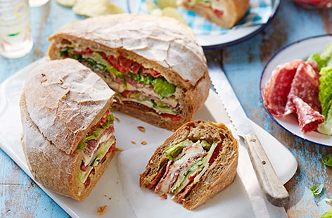 This is not your average sandwich - a delicous shareable savoury treat packed to the brim with Parma ham, brie, roasted red peppers, cucumber and so much more