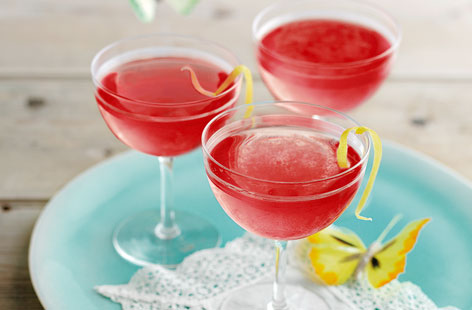 A Pink Lady cocktail coming right up. Shake the ingredients up in a mixer, serve in a Martini glass for extra glamour and enjoy the taste of raspberry with gin and triple sec and a hint of citrussey lemon.