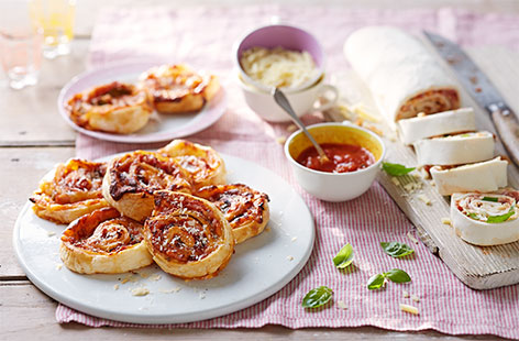 Gorgeous pinwheel bakes packed with not one, not two, but three different types of cheese
