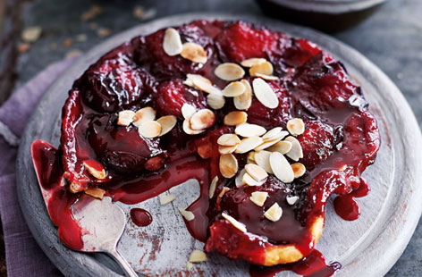 An indulgent variation on the classic tarte Tatin with juicy plums, marzipan and toasted flaked almonds