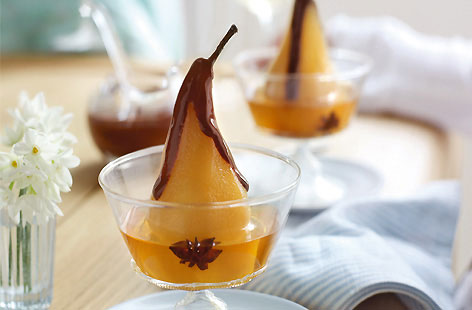 Perfect for entertaining, these sweet, spiced poached pears can be made the day before and stored in the fridge until needed. Serve simply with a drizzle of rich chocolate sauce.