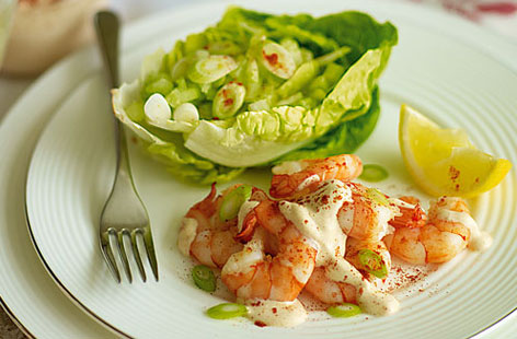 This retro favourite has had a lovely makeover. Traditional Marie Rose is replaced by a crème fraîche with lemon, garlic and paprika. This powerful sauce is a brilliant match for the large prawns and crunchy little gem.