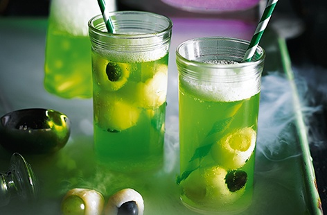 With fiery ginger beer, tangy limeade and scary monster's eyeballs, this spooky punch is a great Halloween party idea that will definitely be a hit with your little ones this Halloween