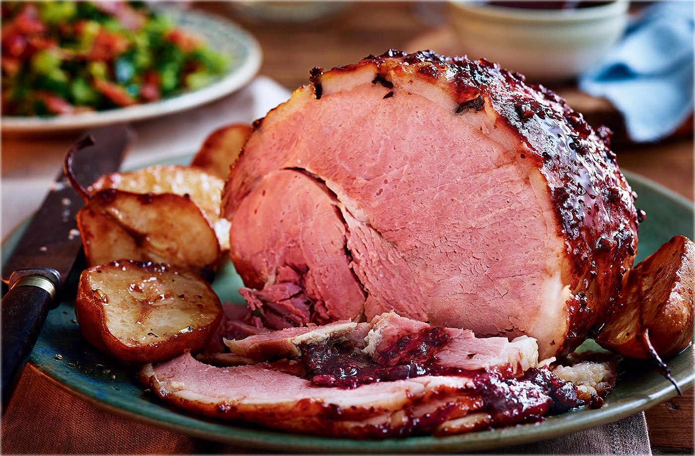 Baked ham with cranberry glaze, roasted pears and bacon greens recipe
