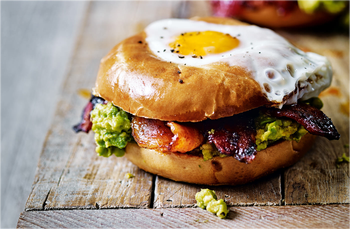 Egg in a hole with spicy bacon and guacamole recipe