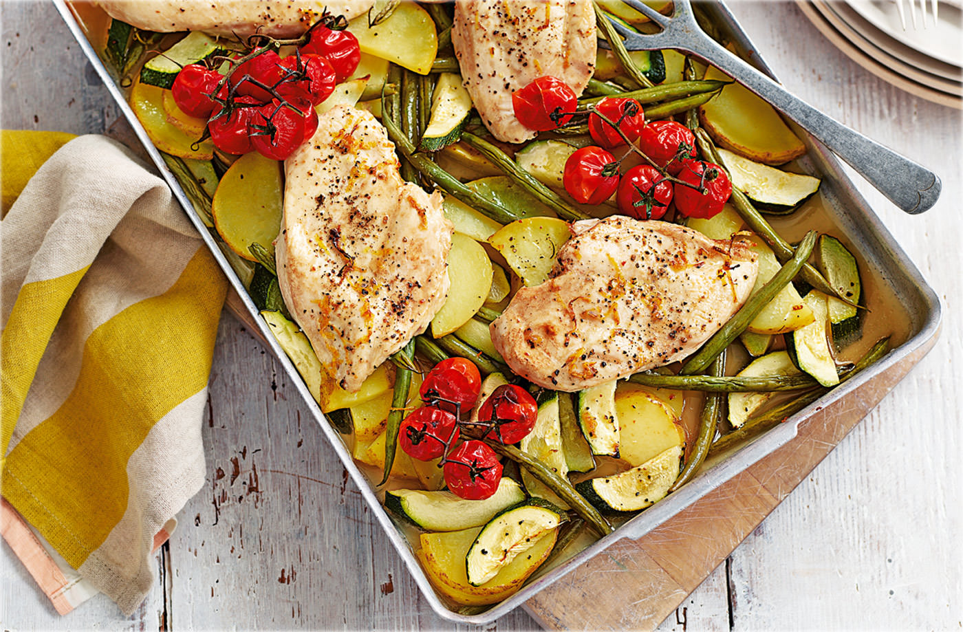Chicken traybake with vine tomatoes and courgettes recipe