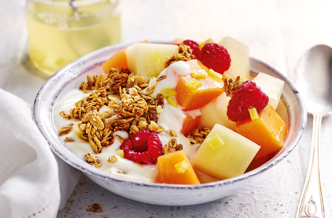Ginger-lemon melon and raspberry breakfast bowl recipe