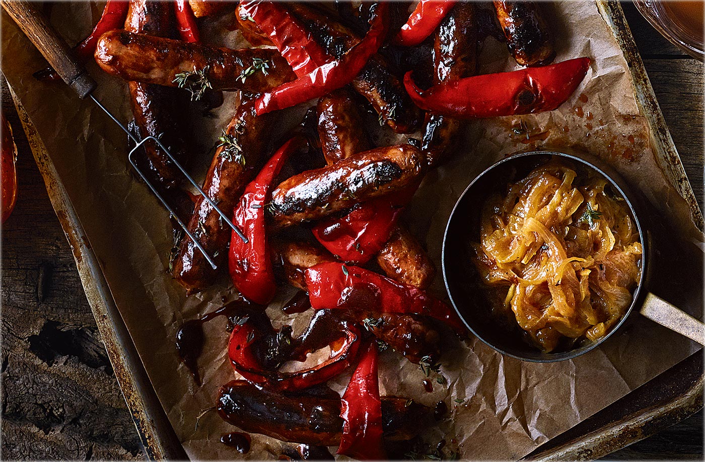 Glazed sausages with beer and mustard onions recipe