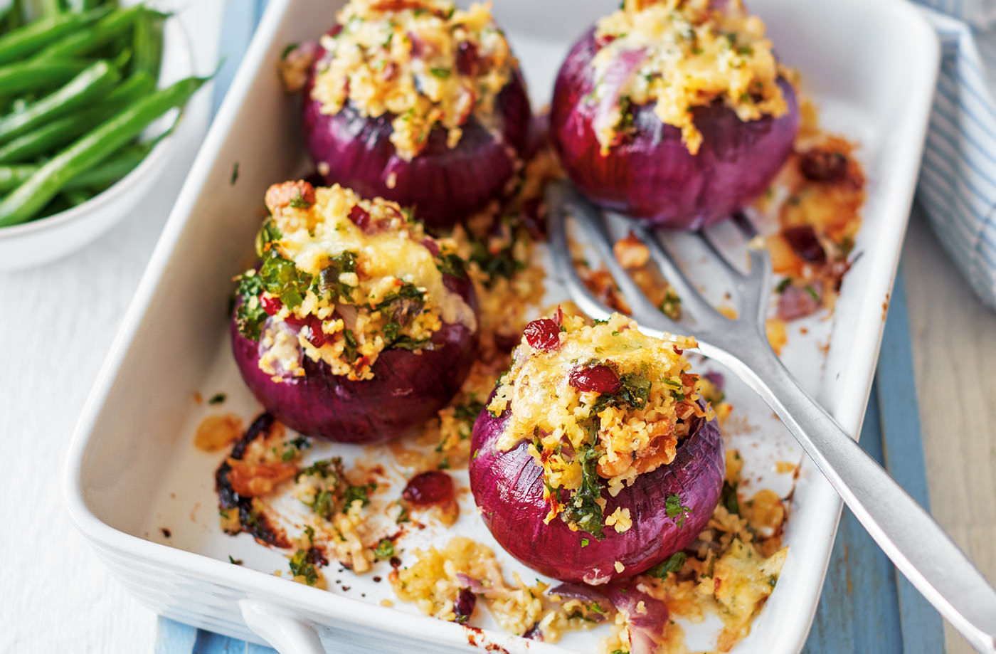 Red onions stuffed with bulgur wheat, celeriac and kale recipe