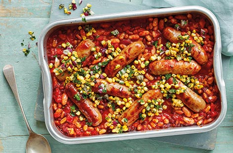 Barbecue sauce is the secret ingredient in this simple roast traybake – providing a sticky glaze on the sausages and glossy sauce all in one. Served with a fresh charred corn salsa, this is destined to become a family favourite. 