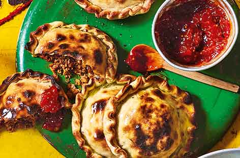 Give classic Indian street food a try with these moreish stuffed naan breads. Homemade naan dough is super easy to make and fragrant spiced chicken makes a delicious filling in every bite. Serve with lemon wedges and tangy tomato chutney for dipping.