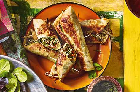 These Indian-inspired brunch wraps are packed with flavour throughout every bite: spiced mashed potato, fresh veg coleslaw, chilli eggs and tangy mint chutney. The stuffed wraps are then fried until crisp for a delicious finishing touch.