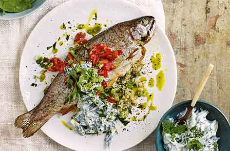 For a smart dinner party main, serve everybody their own whole trout. Stuffed with herby bulgur wheat and cooked with fresh tomatoes, this impressive yet simple Mediterranean-inspired dish is a brilliant way to try something different with fish.