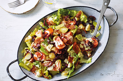 Take the flavours of a classic sandwich and transform them into this hearty BLT potato salad recipe. Crispy bacon, juicy tomatoes and fresh lettuce combine with caramelised red onions and a punchy mustard dressing to update this traditional barbecue side.