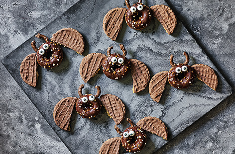 With edible eyes, pretzel ears and biscuit wings, these adorable chocolatey treats are perfect for a kids' Halloween party.