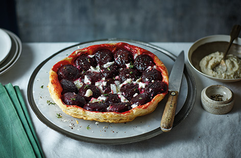 This bold beetroot and goat’s cheese tarte Tatin proves this classic French dish doesn't have to be just for dessert. With caramelised beetroot, creamy cheese and crisp puff pastry, this striking tart makes an impressive vegetarian main.