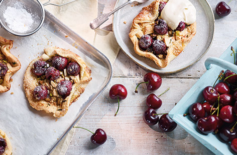For a great summer dessert, look no further than this mini galette recipe made with juicy cherries, white chocolate and pistachios