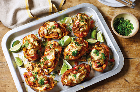 Forget plain jacket potatoes, these loaded fajita sweet potatoes are sure to be a new family favourite. Filled with spiced peppers and chicken, the stuffed potato skins are topped with melting cheese for irresistible Mexican-inspired comfort food.