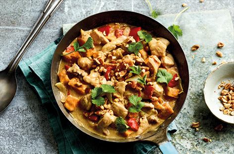 Creamy peanut stews are a familiar dish in West African cooking and this easy chicken version is a delicious one to try, packed with tender chicken, sweet potatoes and pepper, all cooked in a spiced peanut butter sauce.  