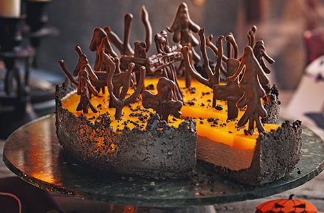 This spooky chocolate orange cheesecake recipe is the perfect dessert for your Halloween party. With a crumbly Oreo base, cream cheese chocolate filling and an orange jelly top, it's guaranteed to impress
