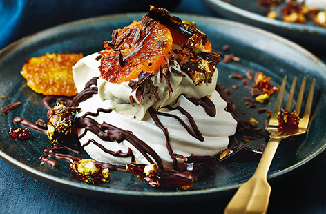 With shards of pistachio-jewelled brittle, sweet caramelised clementines and boozy orange blossom cream, these stunning Pavlovas are the perfect way to finish your Christmas dinner.