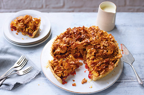 This nostalgic classic brings back fond school-dinner memories in all the best ways. The traditional corn flake tart has been updated with a sticky, golden Crunchy Nut corn flake topping for an extra boost of flavour, layered on top of sweet strawberry jam