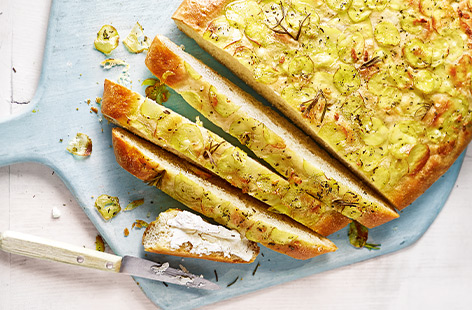 Give homemade bread a go with this easy focaccia recipe. With a soft, springy centre and crisp crust topped off with seasonal new potatoes, this fragrant focaccia is a summer winner. Pack up for picnics or serve as a sharing starter.