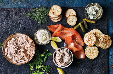 This is the ultimate Christmas party platter – pairing shop-bought blinis and crostini with homemade pâtés and dips is a the ideal way to make a little effort go further