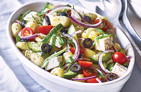 Try a new twist on potato salad with pillowy gnocchi, and combine it with the ingredients from a classic Greek salad for a colourful vegetarian dinner recipe that's ready in under 30 minutes
