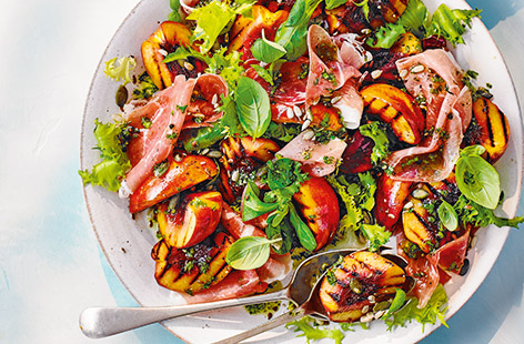 This super summer salad recipe makes the most of juicy nectarines, pairing with prosciutto and a quick basil dressing