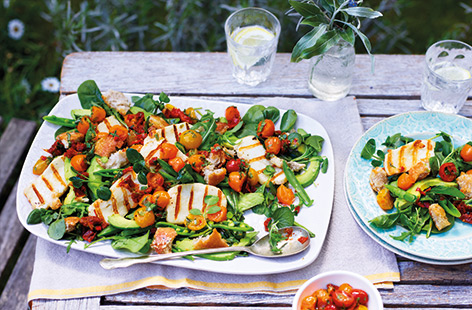 Grilled halloumi cheese and crisp homemade croutons make this vibrant salad feel hearty and substantial. Served with a delicious warm tomato and chilli dressing, this salad is packed full of flavour too.