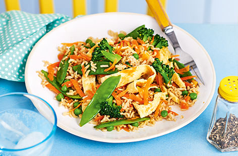 Budding chefs will love making this fried rice almost as much as eating it! Loaded with carrots, broccoli, mangetout and peas, and finished with egg ribbons, this speedy vegetable-packed stir-fry is perfect for a fuss-free weeknight supper.
