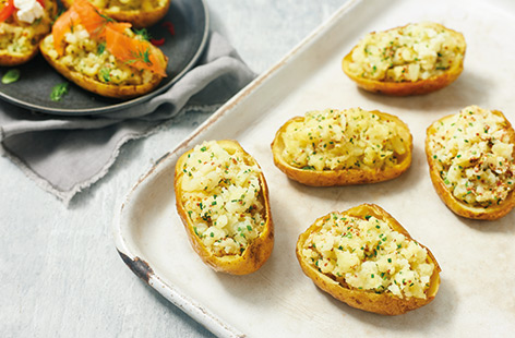 Tuck into cheesy potato skins with this easy recipe that turns baked potatoes into something extra special
