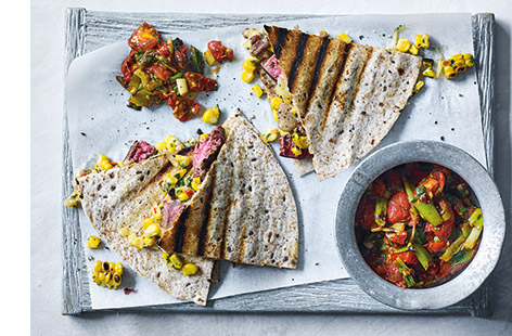 Next time you're cooking steaks on the barbecue, why not try going one step further and using them to fill crisp quesadillas. Juicy slices of steak, charred sweetcorn and a sprinkling of melted cheese make the ultimate BBQ quesadilla filling.