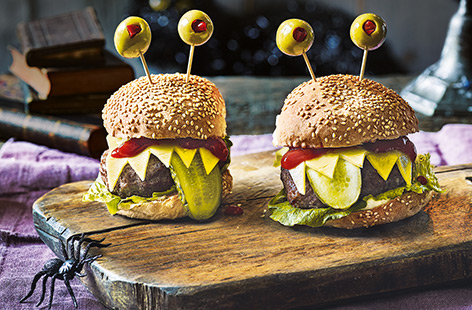 With sharp cheese 'teeth', gherkin 'tongues' and stuffed olive 'eyeballs', these spooky monster burgers are perfect for rustling up for a kids Halloween party