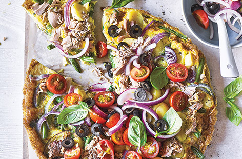 Channel all of the flavours of a classic tuna Niçoise salad with this easy frittata recipe, loaded with potatoes and colourful veg.