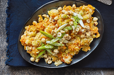 Make parsnip and sweet potato mash extra indulgent with a drizzle of aromatic truffle oil, and scatter through maple-glazed hazelnuts